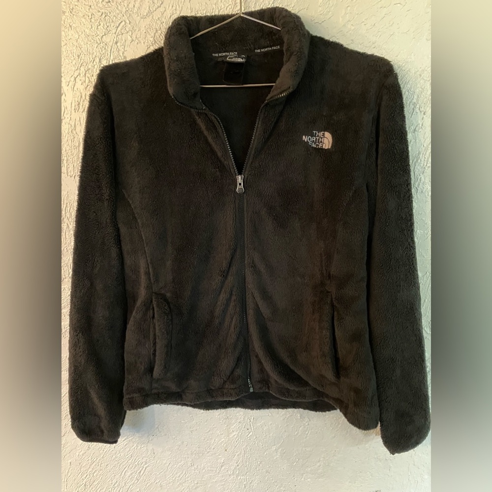 Black North Face girls size large extra fuzzy fleece jacket.